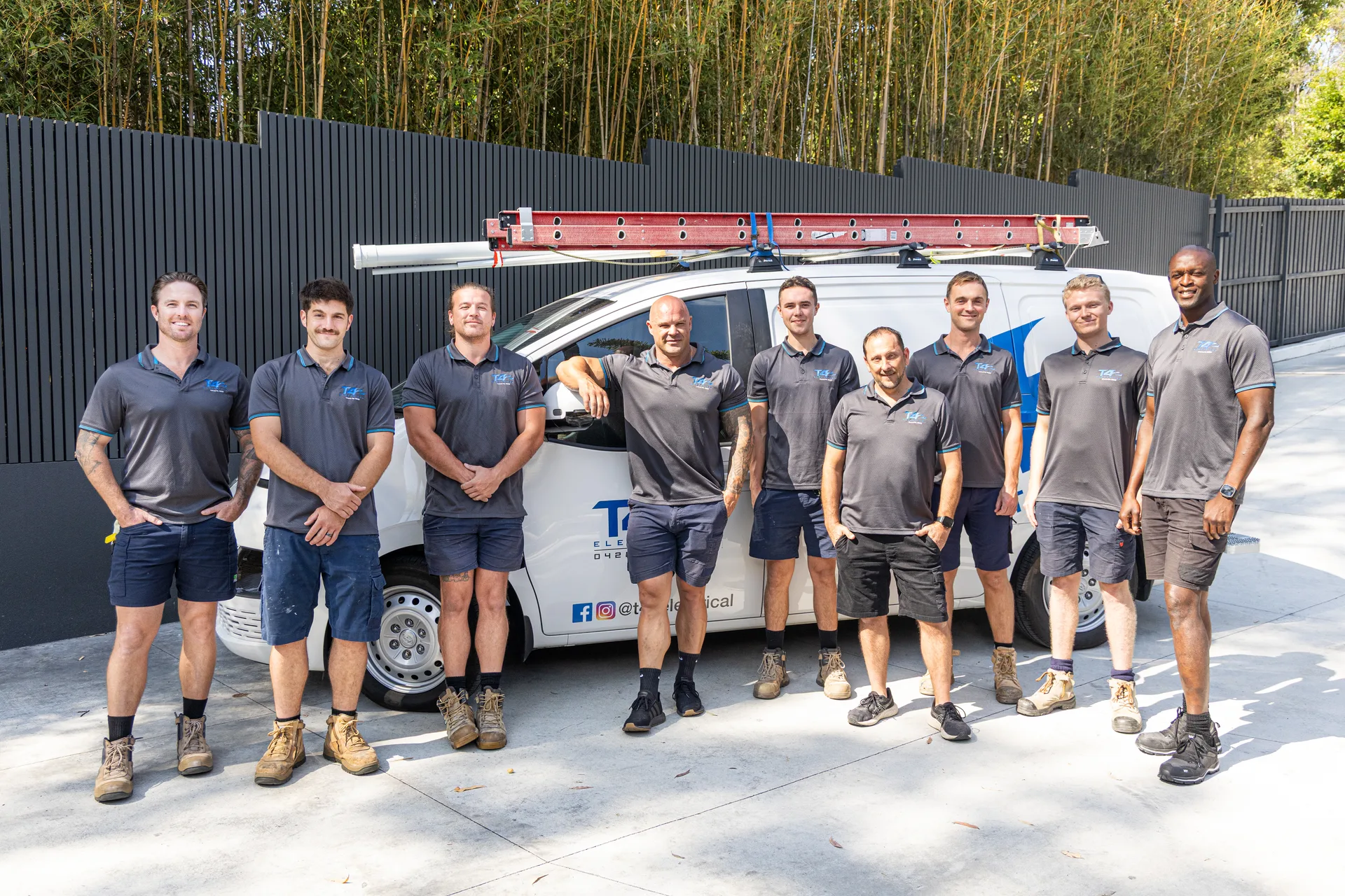 The Family Electrician Ormeau team with a service van